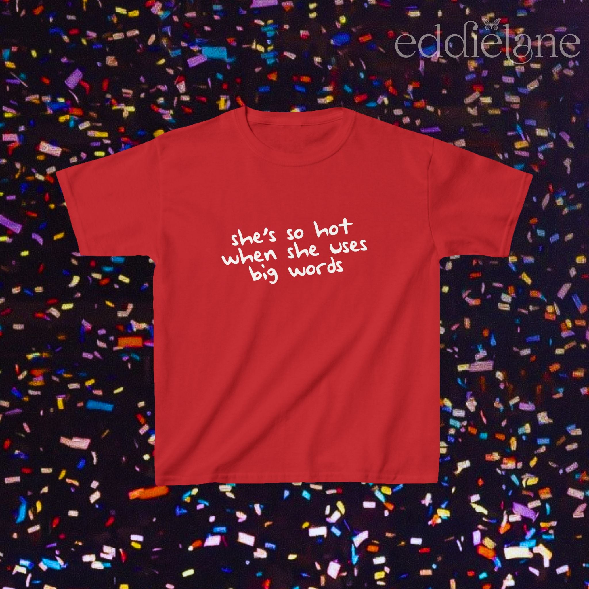 a red baby tee that says "she's so hot when she uses big words"