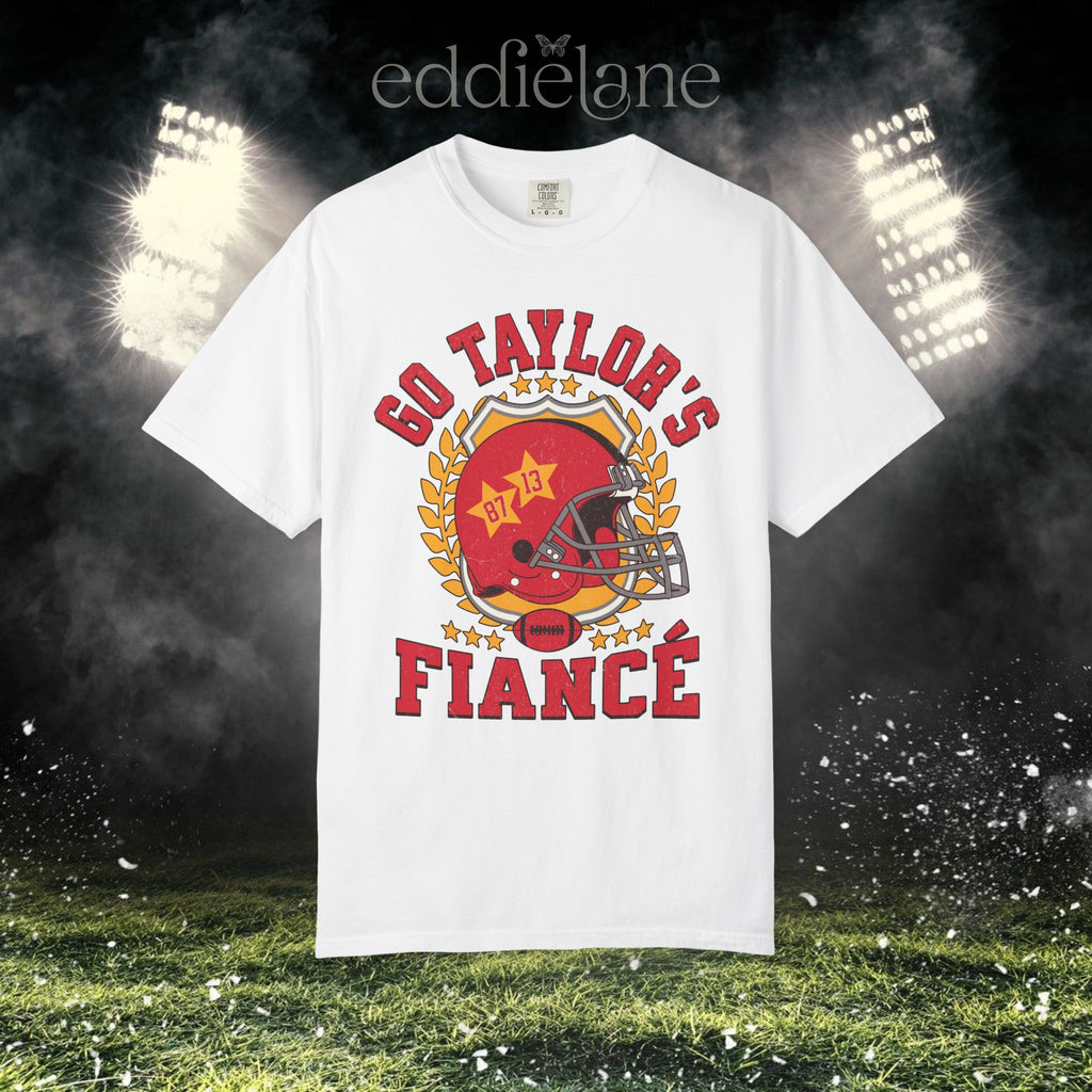 a white t-shirt with a vintage football helmet design and text that says "go taylor's fiance"