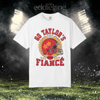 a white t-shirt with a vintage football helmet design and text that says "go taylor's fiance"