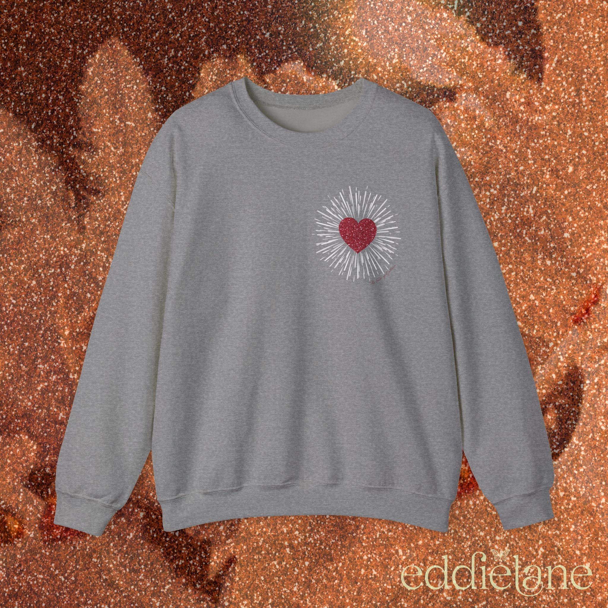 a gray sweatshirt with a red heart design inspired by the fate of ophelia