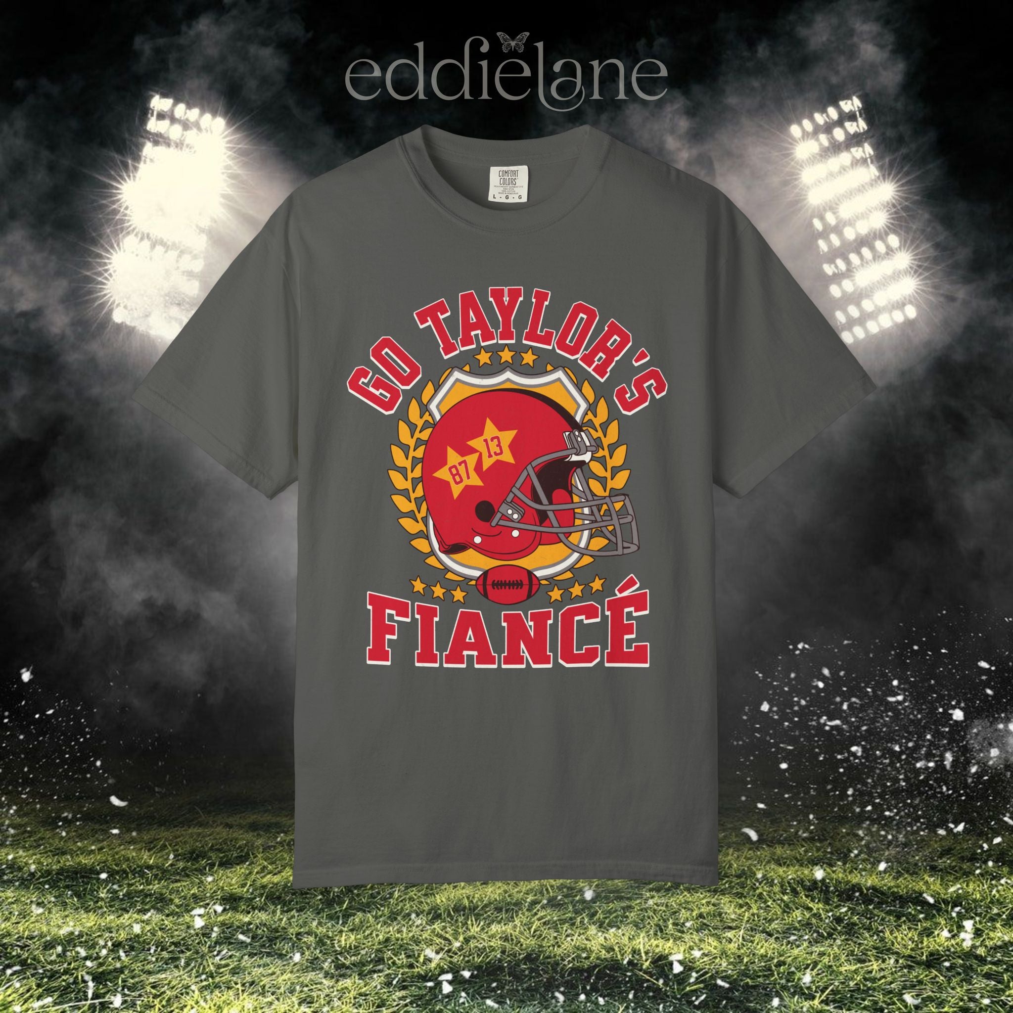 a pepper t-shirt with a vintage football helmet design and text that says "go taylor's fiance"