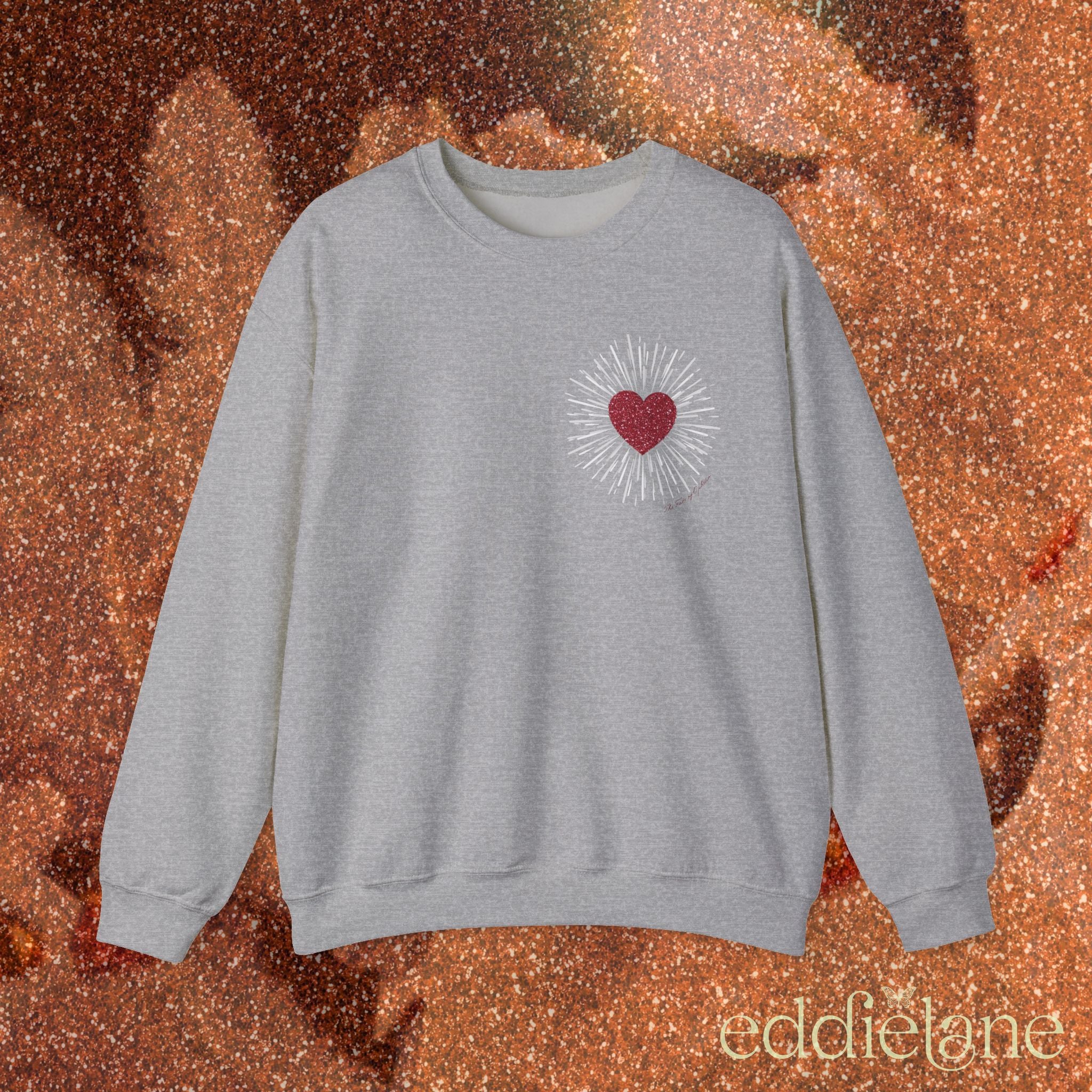 a gray sweatshirt with a red heart design inspired by the fate of ophelia