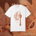 a white comfort colors shirt with a graphic of a tower and the words "all this time i sat alone in my tower"