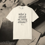 an ivory comfort colors t-shirt that says "who's afraid of little old me" with a graphic of a cat wearing a ghost costume