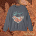 gray sweatshirt with a graphic design of a woman in a martini glass and the word "showgirl"