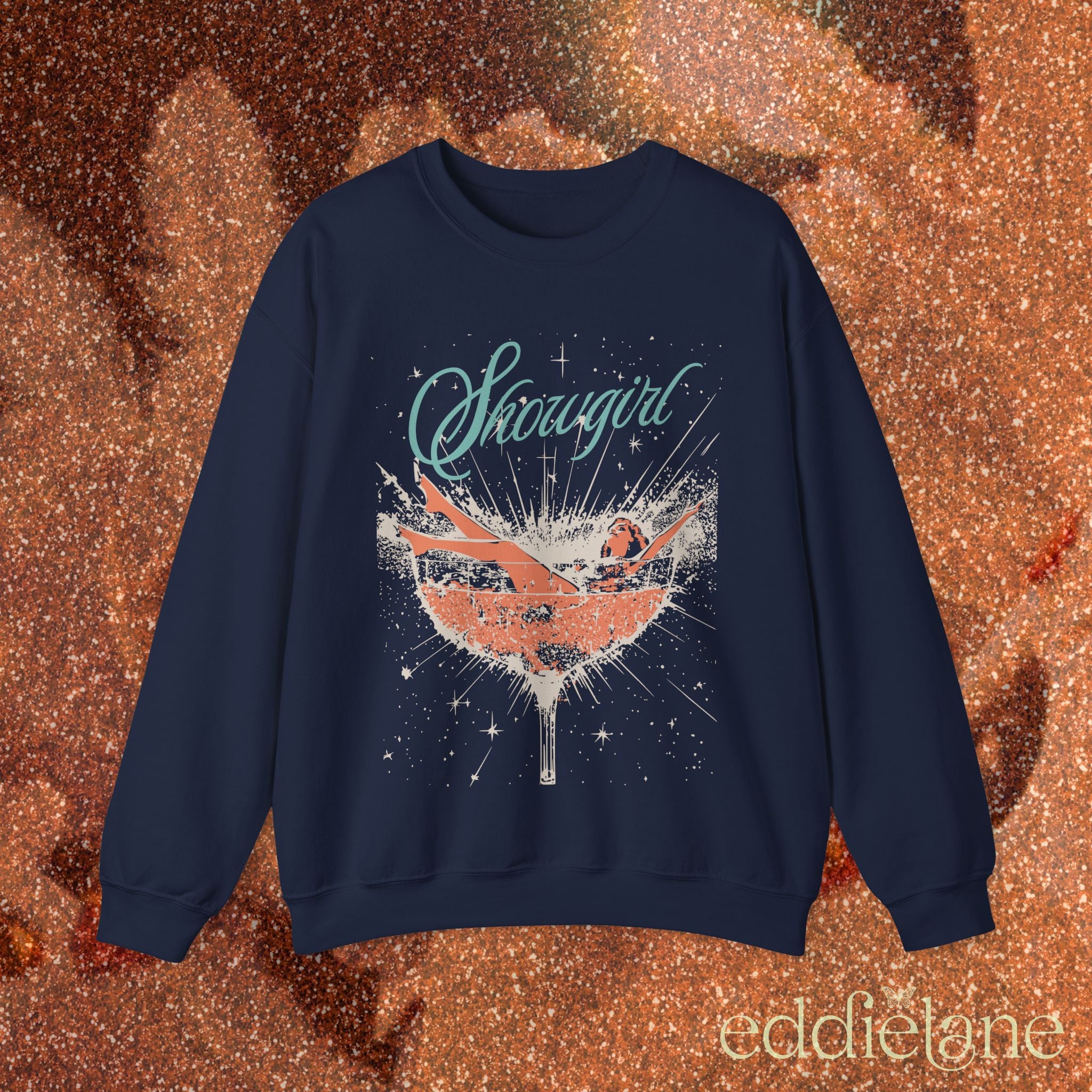 navy sweatshirt with a graphic design of a woman in a martini glass and the word "showgirl"