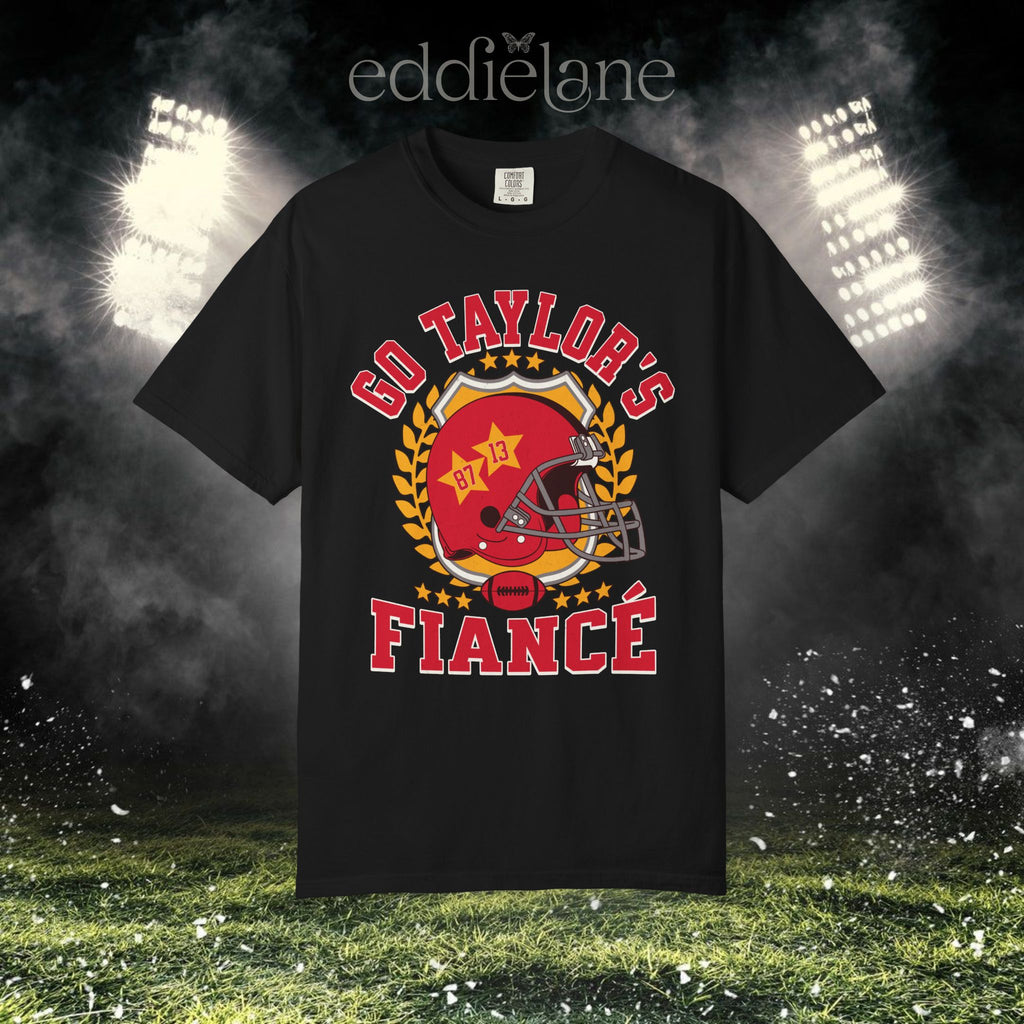 a black t-shirt with a vintage football helmet design and text that says "go taylor's fiance"