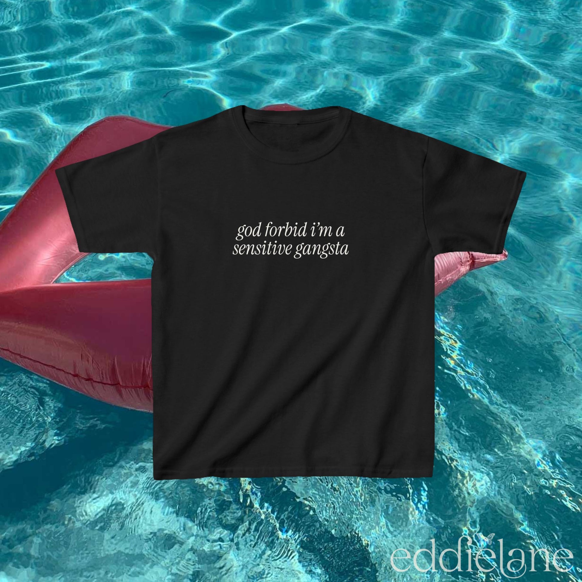 Black baby tee that says "god forbid i'm a sensitive gangsta" inspired by amaya from love island usa.