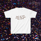 a white baby tee that says "she's so hot when she uses big words"