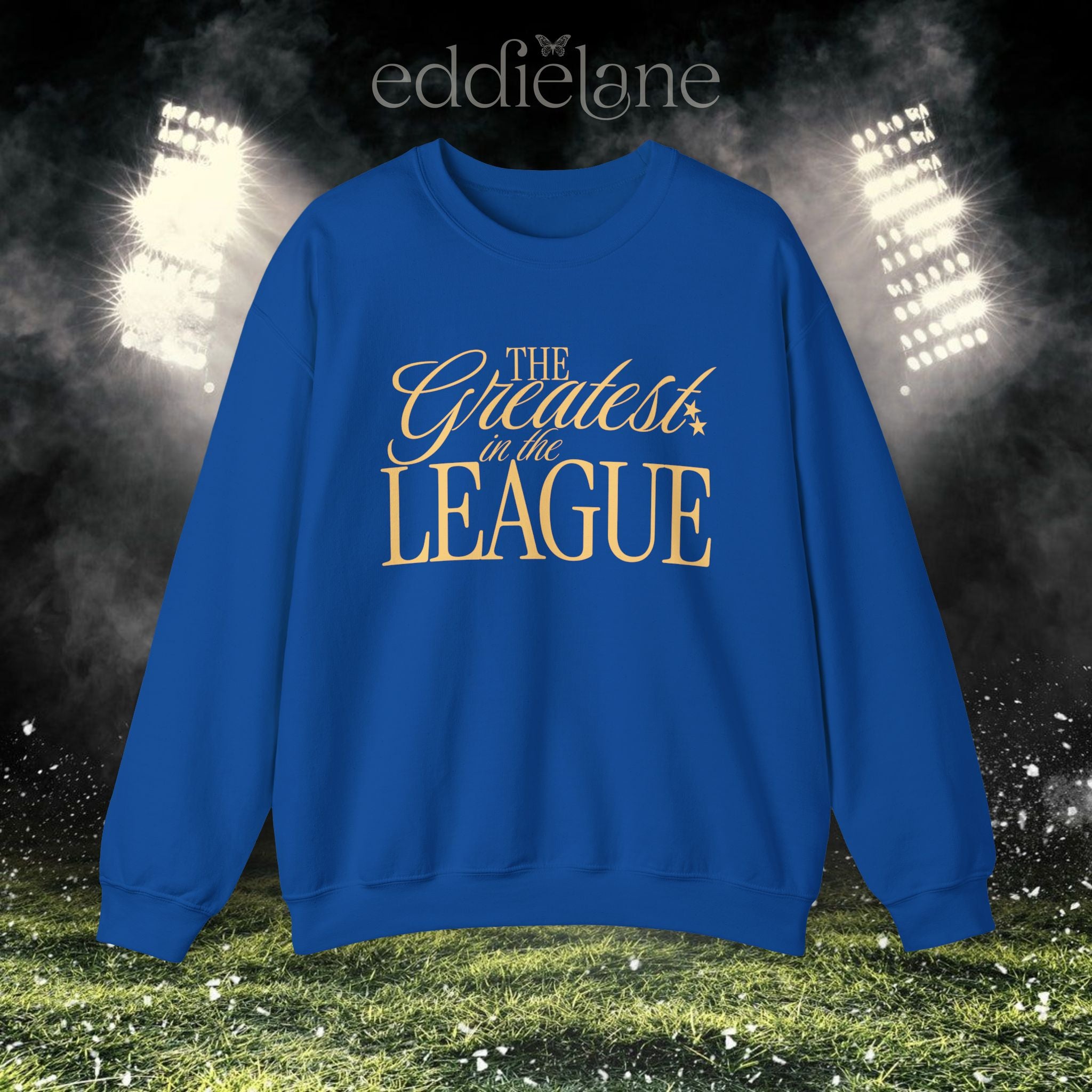 a royal blue crewneck sweatshirt that says "the greatest in the league"