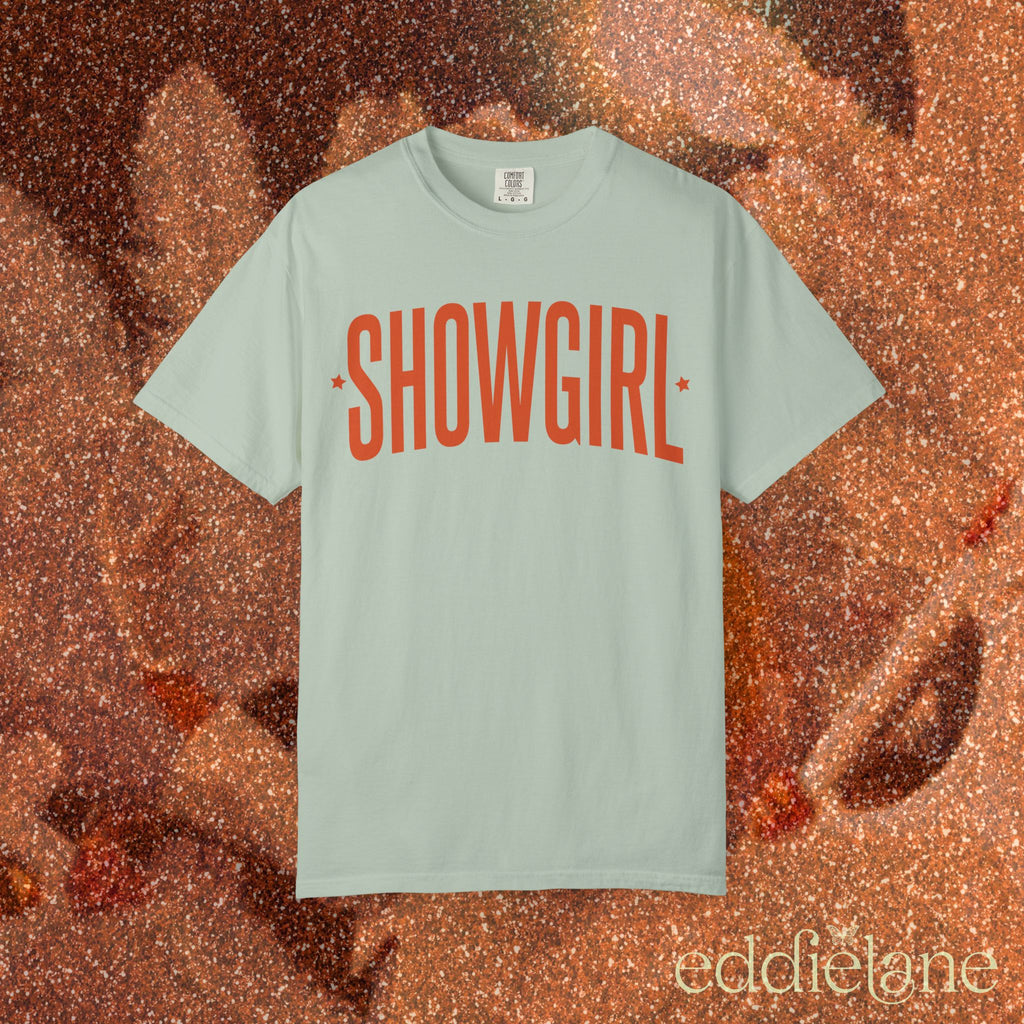 bay green comfort colors graphic tee that says 'SHOWGIRL' with two small stars 

bay green showgirl tee