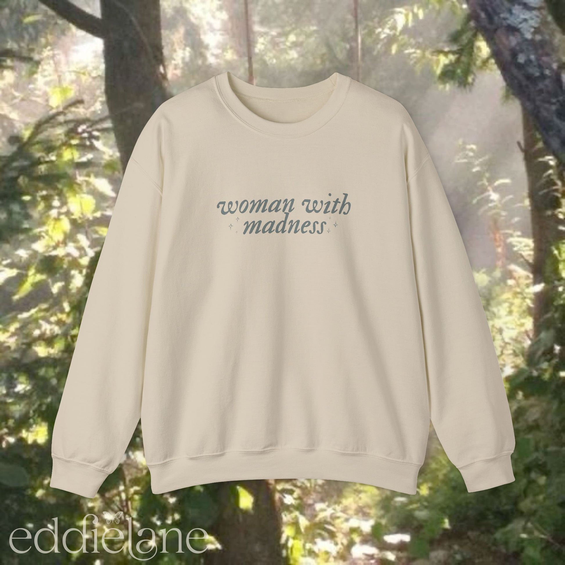 beige sweatshirt with 'woman with madness' inspired by the last great american dynasty from taylor swift's folklore.
beige swiftie sweatshirt woman with madness
