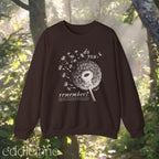 brown sweatshirt with dandelion graphic and text that says "do you remember" 