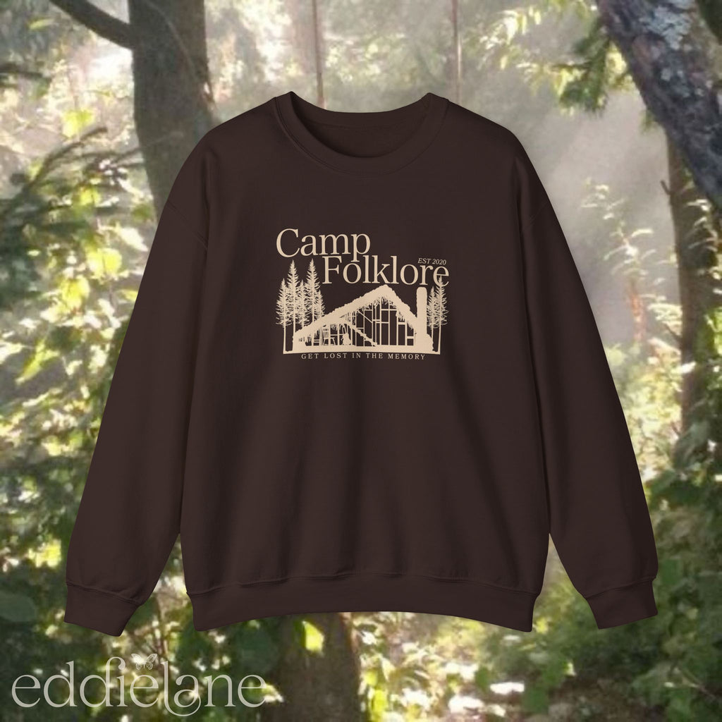 Brown sweatshirt with 'Camp Folklore' design featuring the Folklore cabin inspired by Taylor Swift's Folklore album.
camp folklore sweatshirt brown