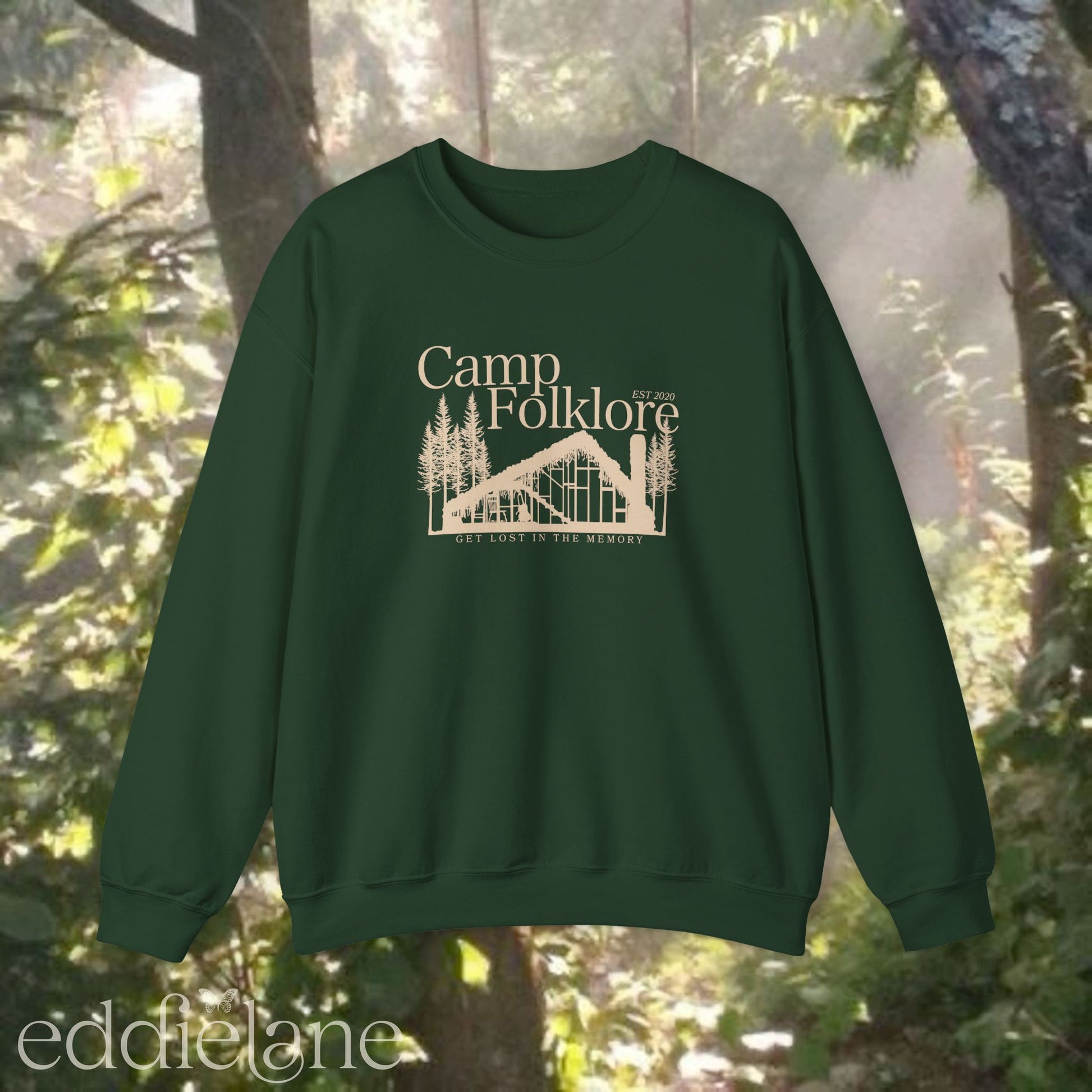 Forest green sweatshirt with 'Camp Folklore' design featuring the Folklore cabin inspired by Taylor Swift's Folklore album.
camp folklore sweatshirt forest green