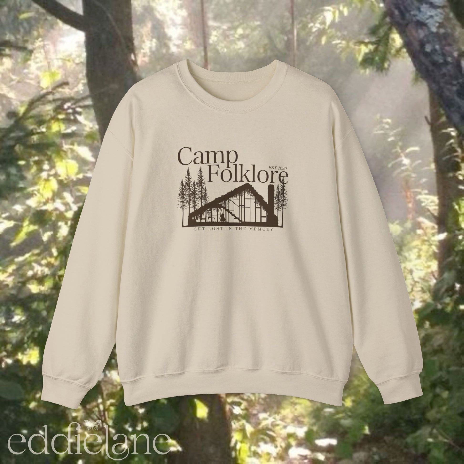 Sand sweatshirt with 'Camp Folklore' design featuring the Folklore cabin inspired by Taylor Swift's Folklore album.
camp folklore sweatshirt sand