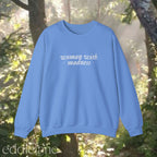 carolina blue sweatshirt with 'woman with madness' 

