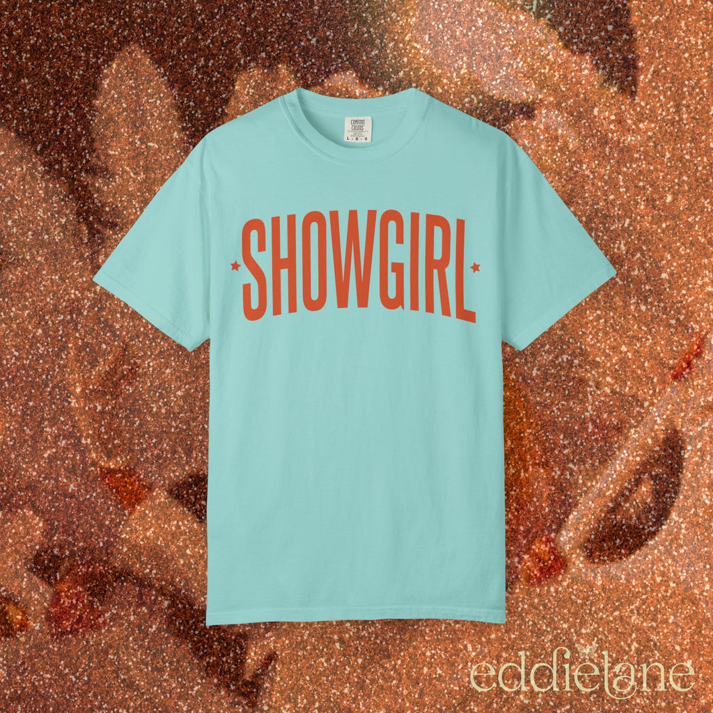 chalky mint comfort colors graphic tee that says 'SHOWGIRL' with two small stars 

chalky mint showgirl tee