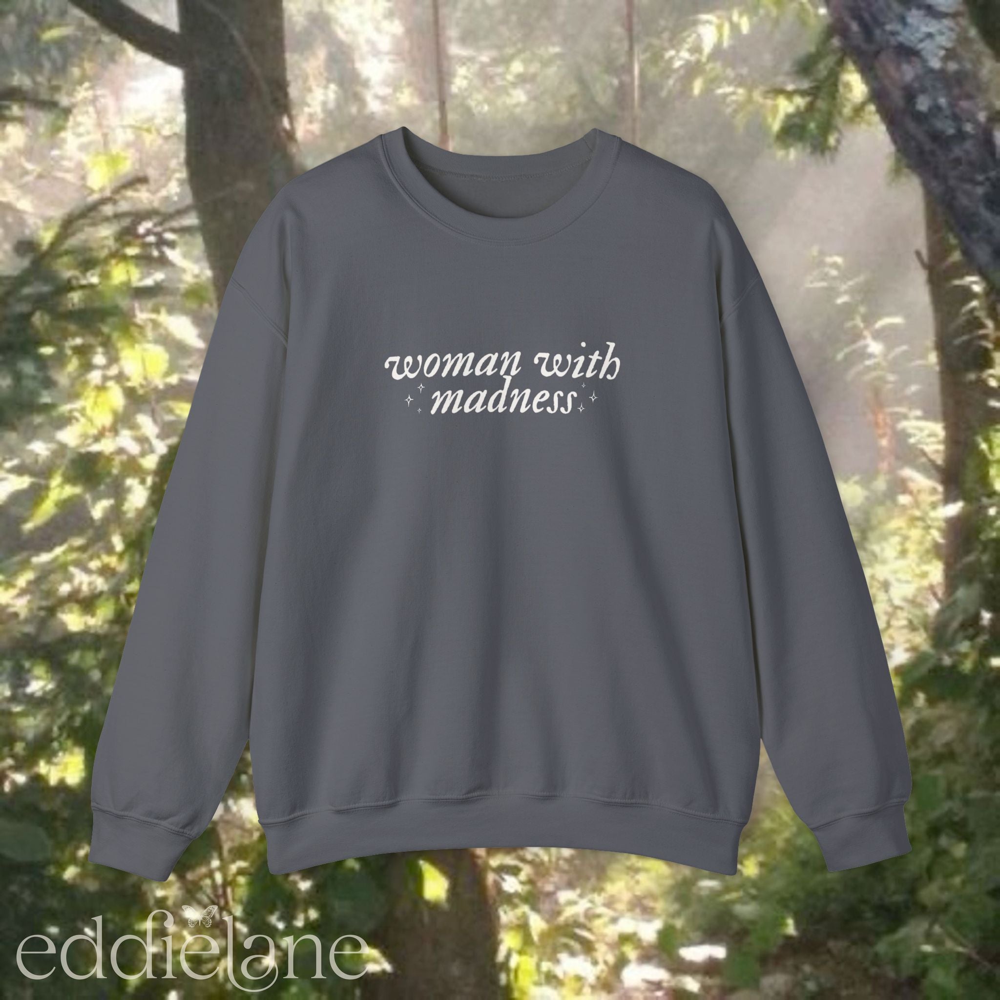 charcoal gray sweatshirt with 'woman with madness' 
charcoal gray sweatshirt woman with madness
