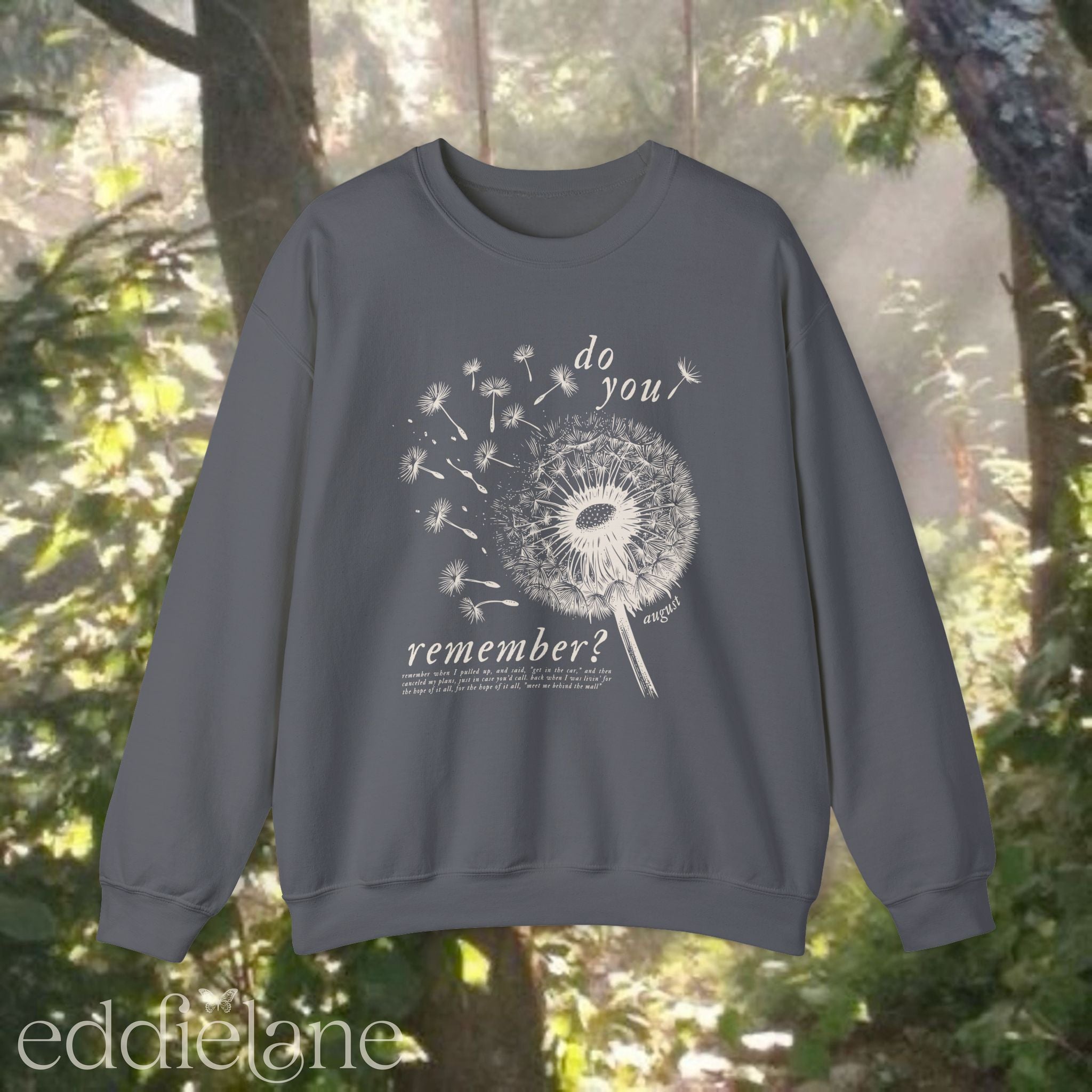 gray sweatshirt with dandelion graphic and text that says "do you remember" 