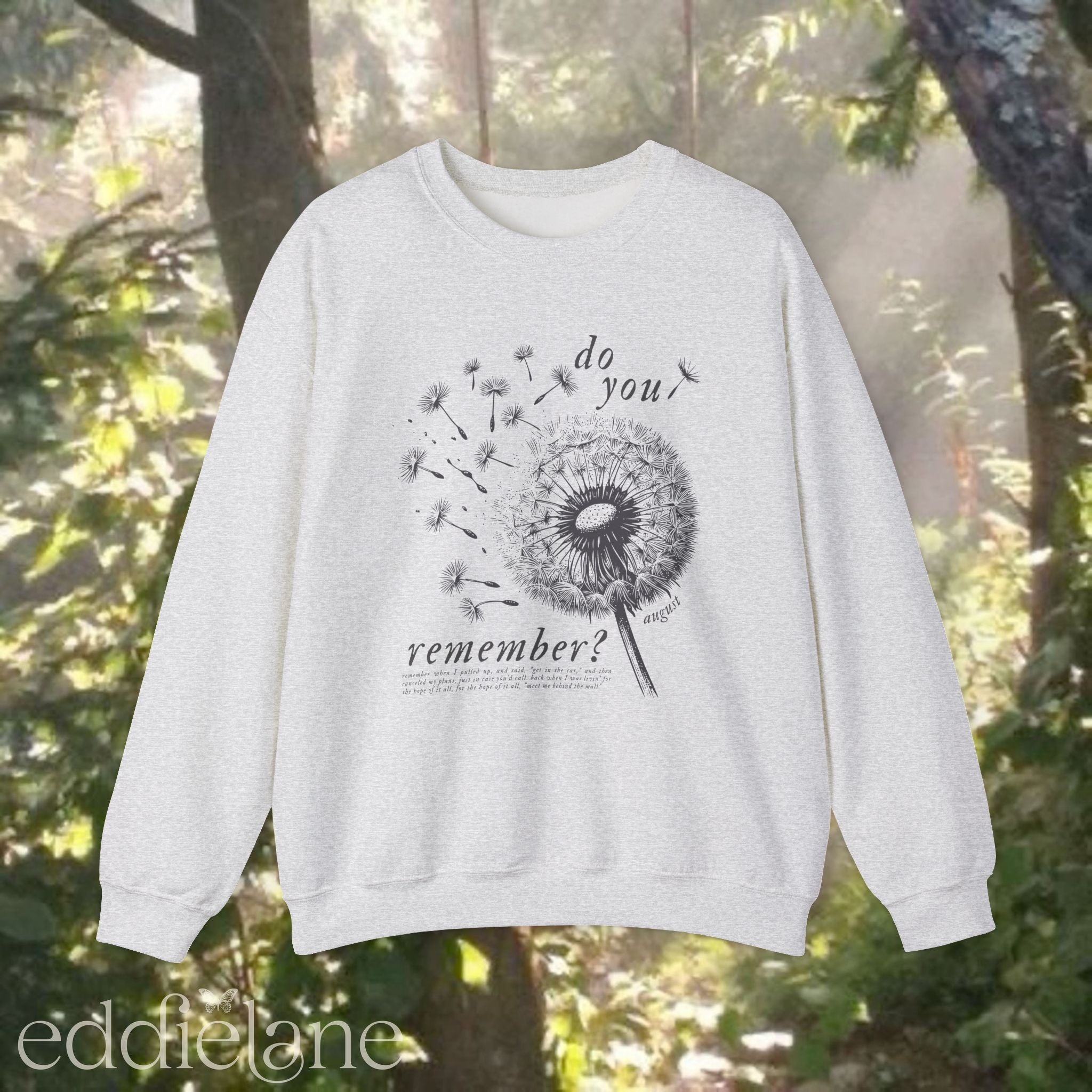 Gray sweatshirt with dandelion graphic and text that says "do you remember" 