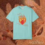 a minty green t-shirt with a heart in flames graphic and the words "and, baby, that's show business for you" 
heart on fire chalky mint