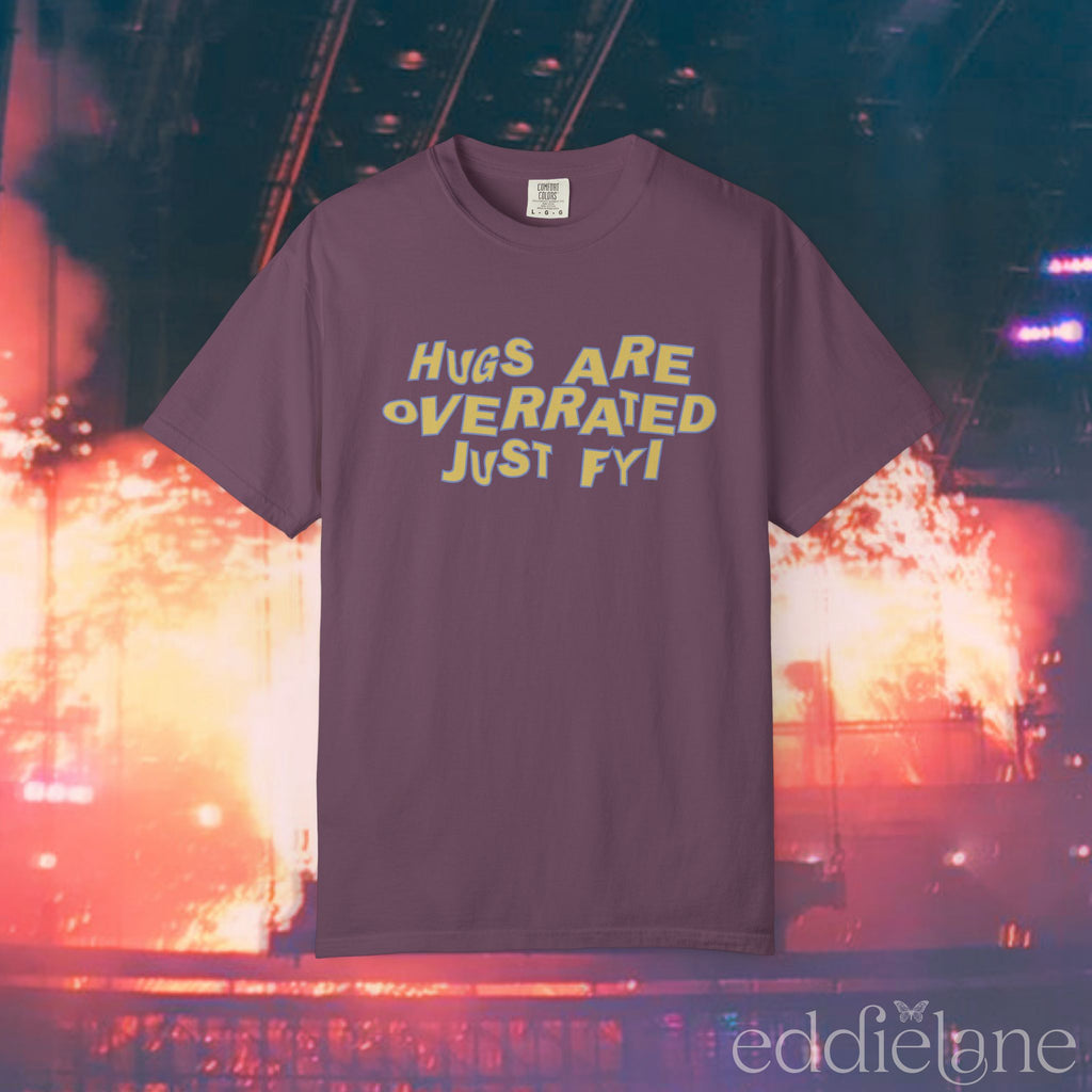 A berry comfort colors t-shirt that says "hugs are overrated just fyi" 

