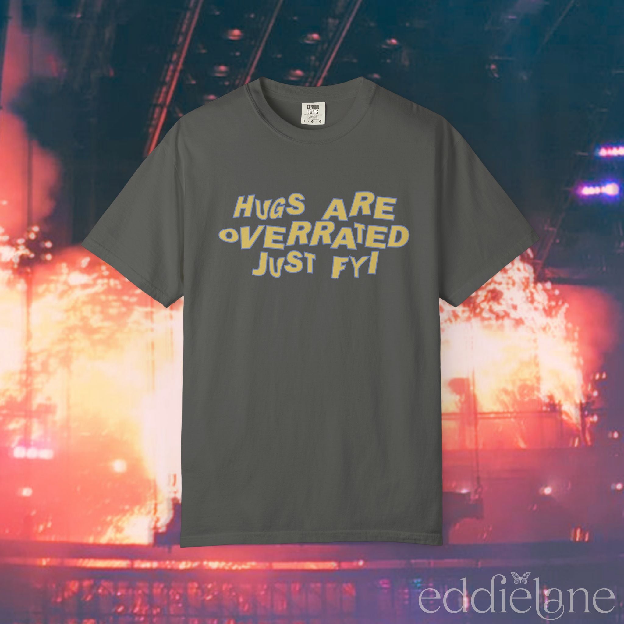A gray comfort colors t-shirt that says "hugs are overrated just fyi" 