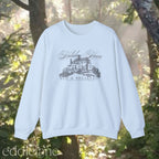 light blue crewneck sweatshirt that says "Holiday House Bed and Breakfast" 
