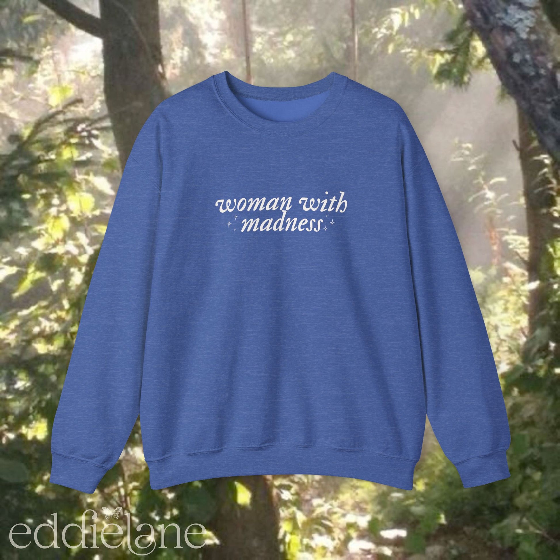 royal heather blue sweatshirt with 'woman with madness' inspired by the last great american dynasty from taylor swift's folklore.
royal heather blue swiftie sweatshirt woman with madness

