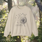 Sand sweatshirt with dandelion graphic and text that says "do you remember" 