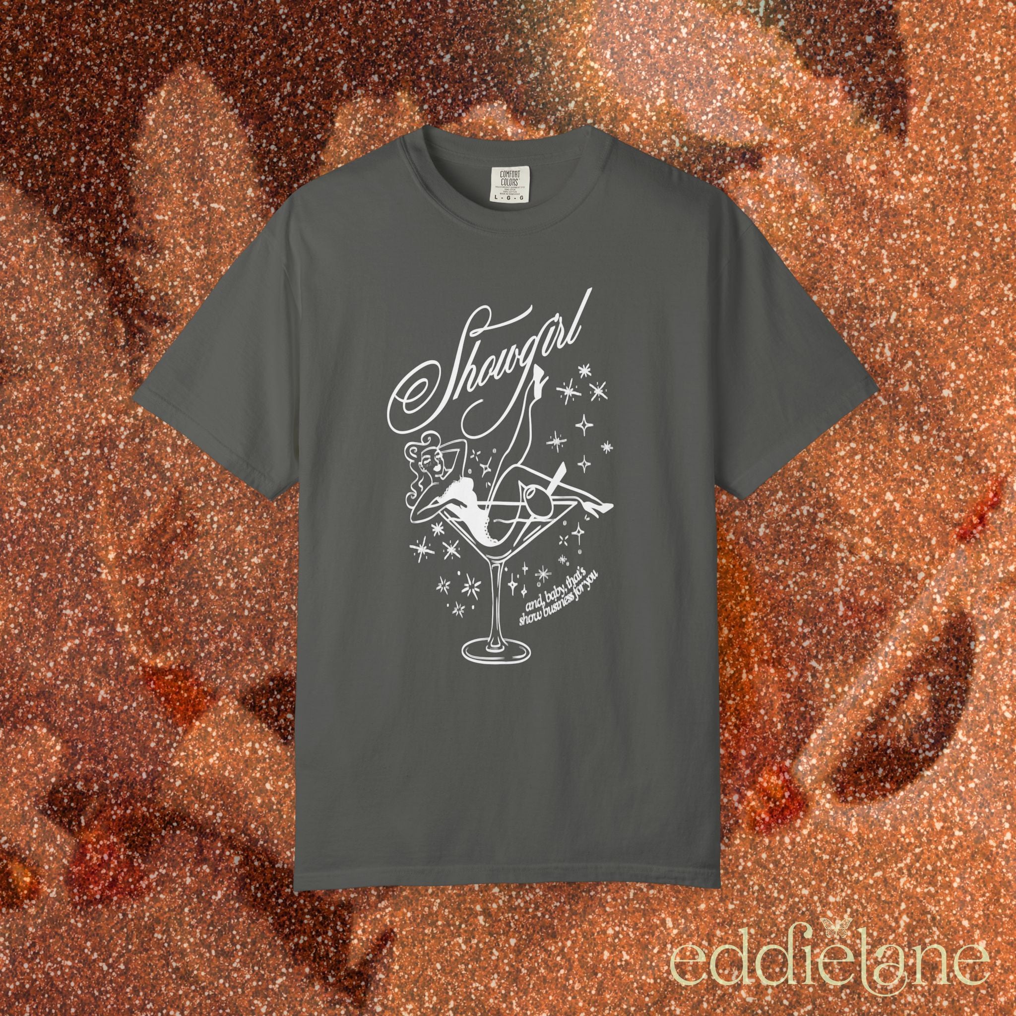 gray t-shirt with a graphic of a showgirl in a martini glass 
pepper ivory comfort colors shirt