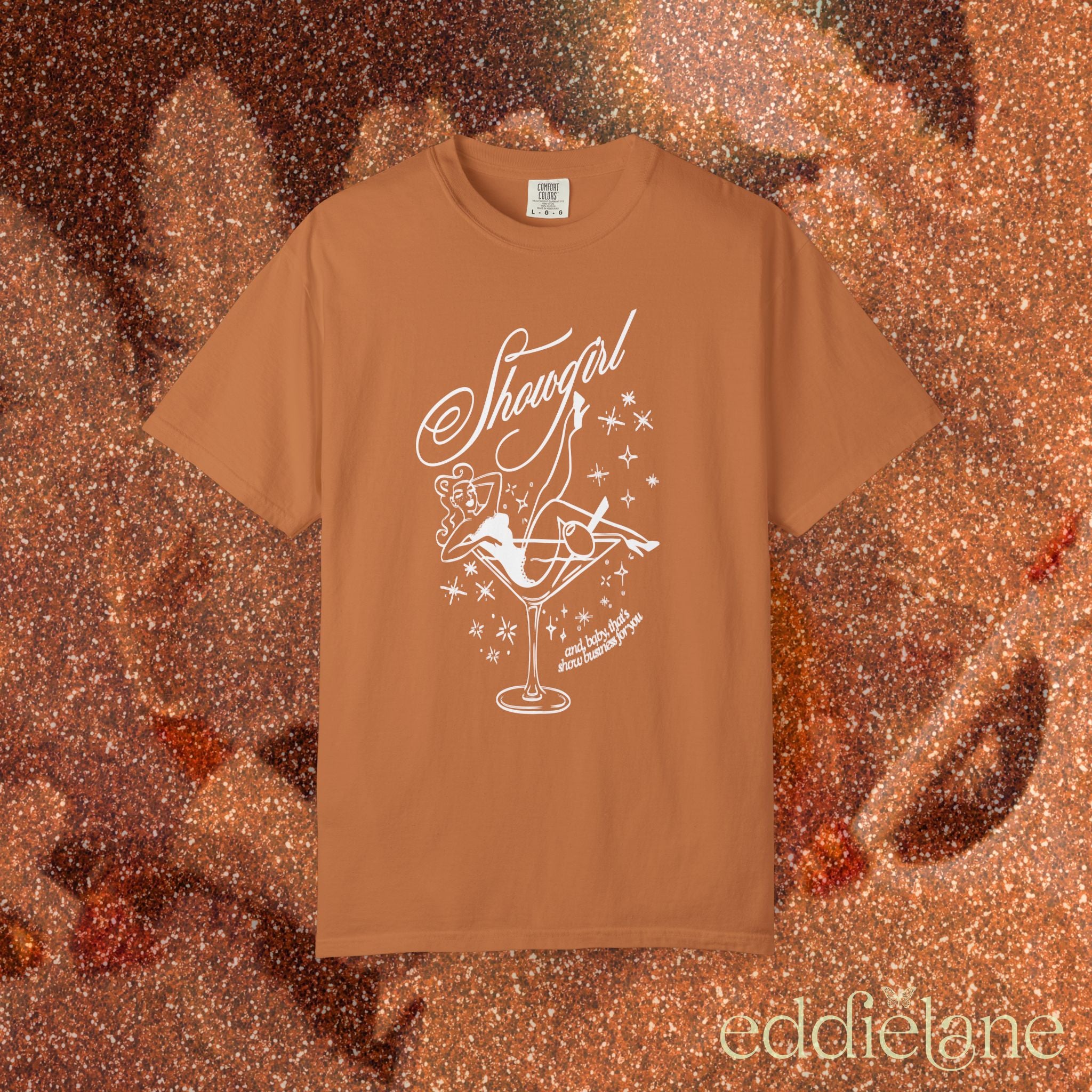 yam orange t-shirt with a graphic of a showgirl in a martini glass 
yam ivory comfort colors shirt