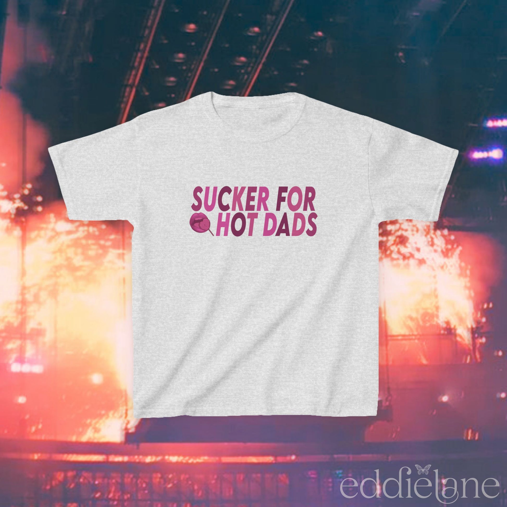 a light gray baby tee with dark pink design that says "sucker for hot dads" inspired by the jonas brothers.

sucker for hot dads light gray baby tee