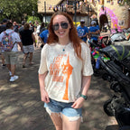 woman wearing an ivory comfort colors shirt with a graphic of a tower and the words "all this time i sat alone in my tower"